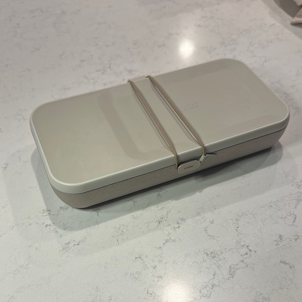 Compact Beige Electronics Storage Box